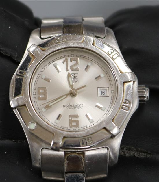 A ladys stainless steel Tag Heuer Professional quartz wrist watch, with box and paperwork.